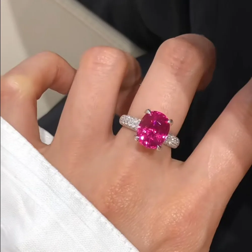 Exquisite 925 Sterling Silver Ruby Spangled Open Ring for Women. Fashionable Gemstone Jewelry with Bold Settings.