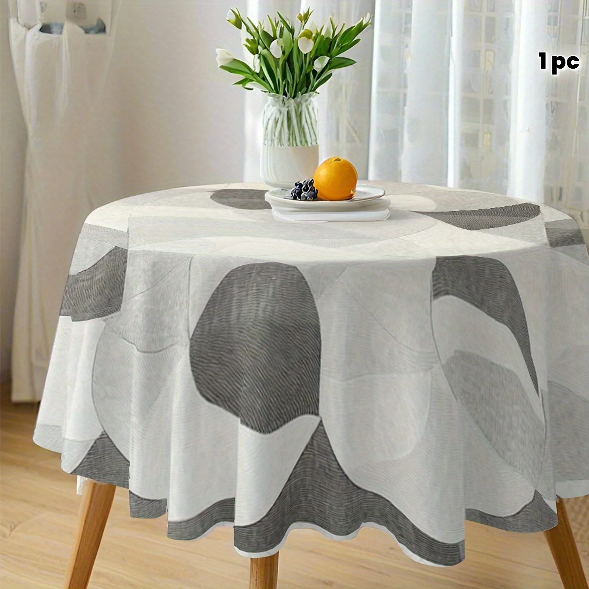 One grey and white circular geometric pattern tablecloth - made of durable polyester fabric.