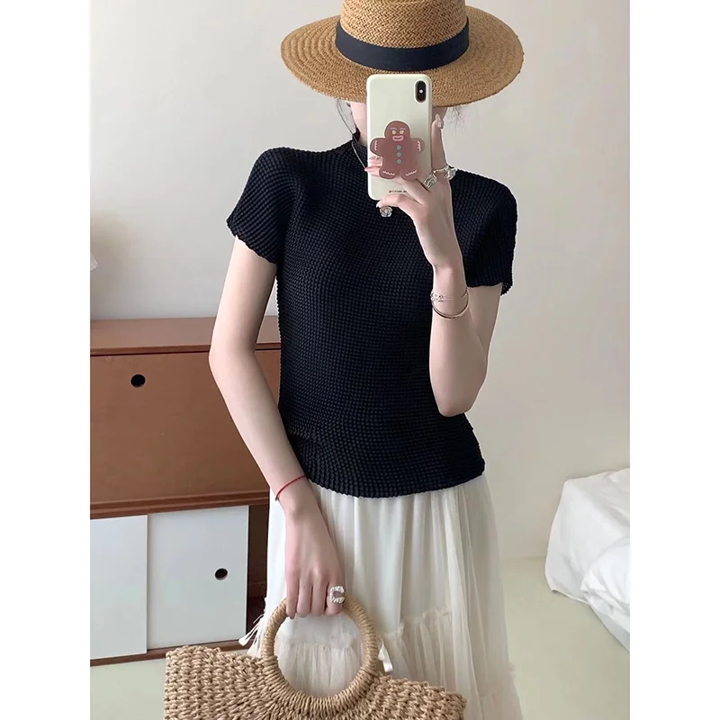 Nuevo Top plisado para mujer, camiseta de manga corta con cuello redondo ajustada elástica y elegante con temperamento para primavera y verano
