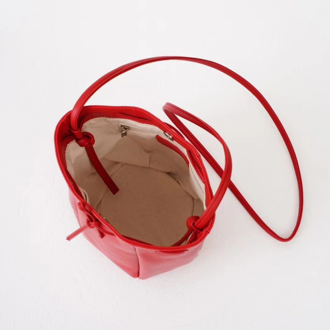 Sheepskin drawstring bucket bag 2025 new spring niche design genuine leather shoulder bag soft women's mini yellow crossbody bag - Image 5