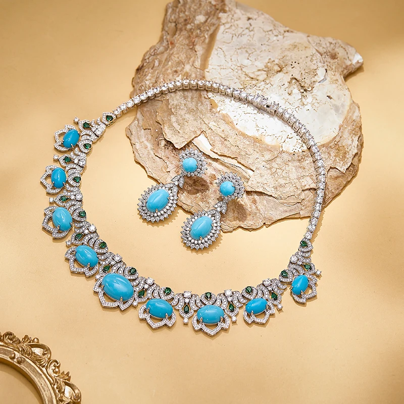 

Комплект ювелирных украшений для женщин: серьги-гвоздики и ожерелье с инкрустацией из кубического циркония, овальных бирюзовых элементов и кисточками, для вечерних мероприятий, в европейско-американском стиле