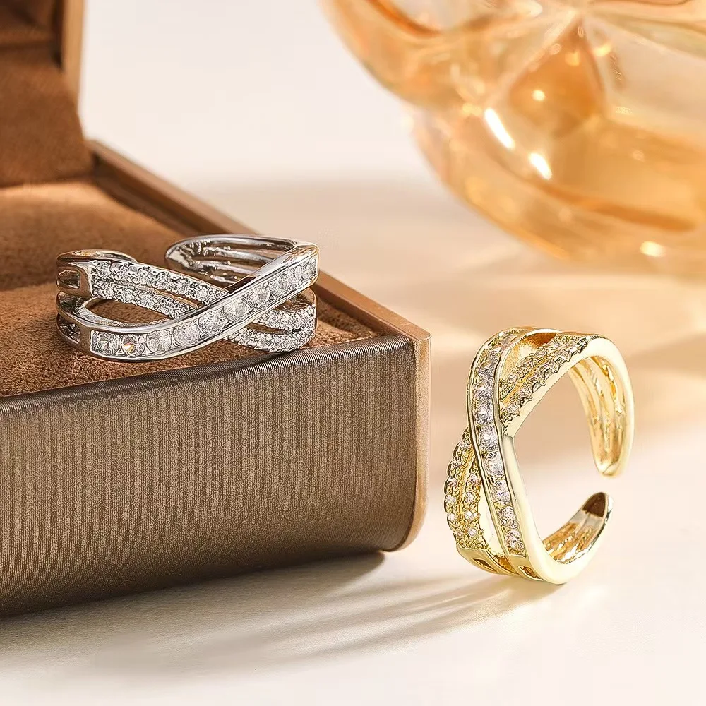 High-end minimalist ring, understated luxury, cool-toned niche design, simple and fashionable personalized open ring accessory.