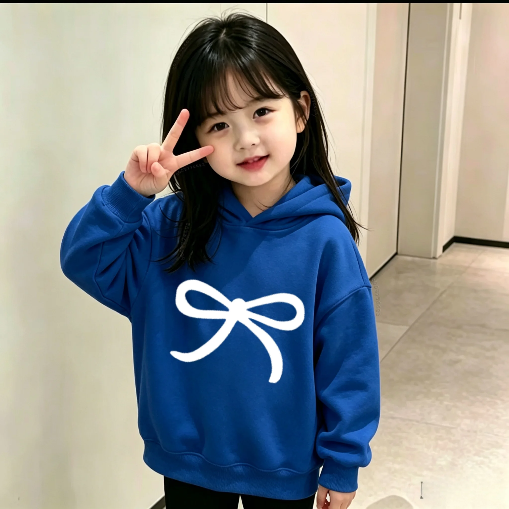 Latest model - Children's casual warm hooded sweater. Boys' and girls' fashionable bow-print pullover hoodie.