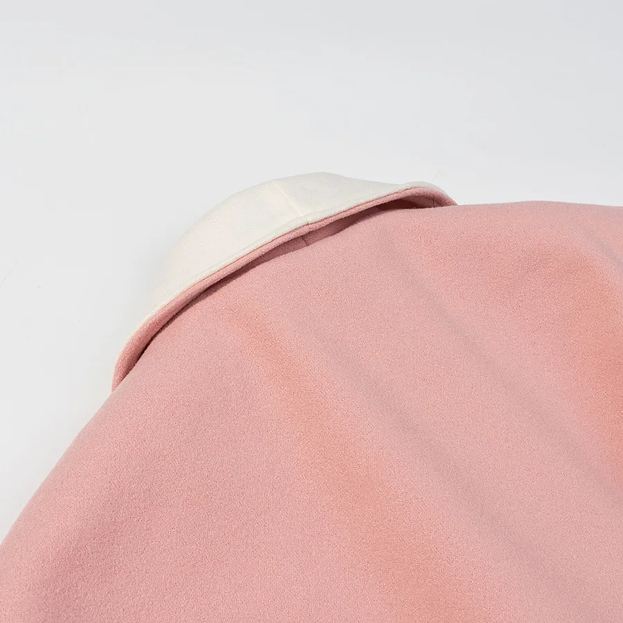 Nueva ropa de mujer europea y americana de otoño e invierno, temperamento femenino, puños peludos, chaqueta de abrigo de lana, 2025