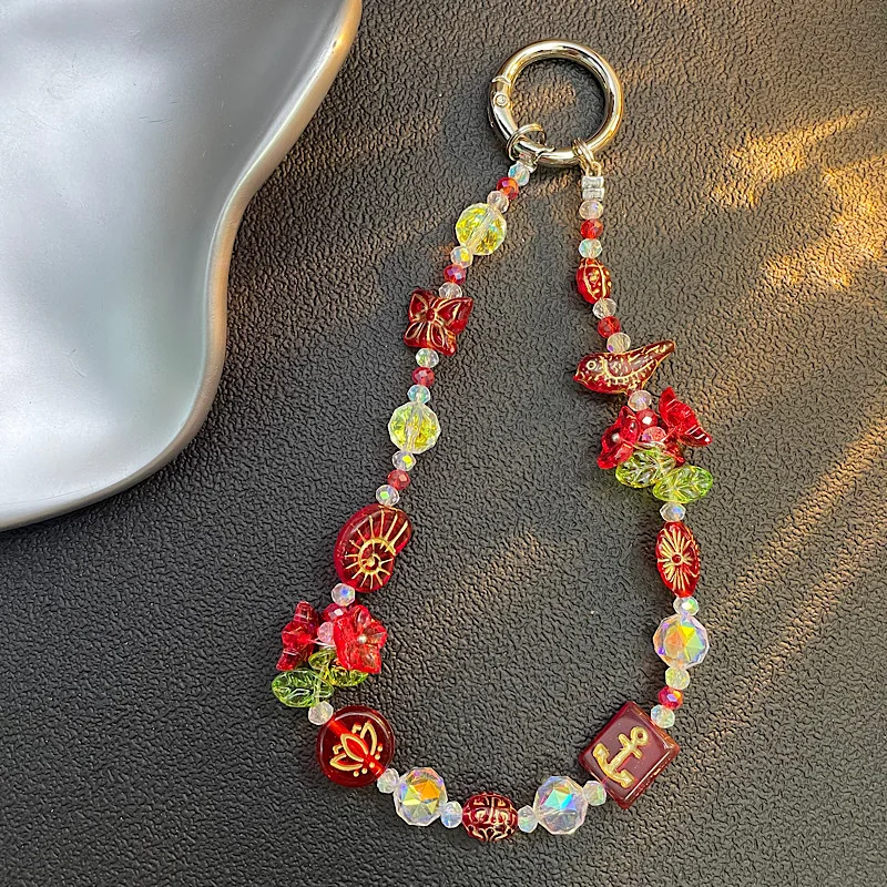 

Ремешок для телефона на запястье, короткий, с подвеской в виде экзотической орхидеи-колокольчика, универсальный, для чехлов на телефон, ключей, сумок, для iPhone 17, 16