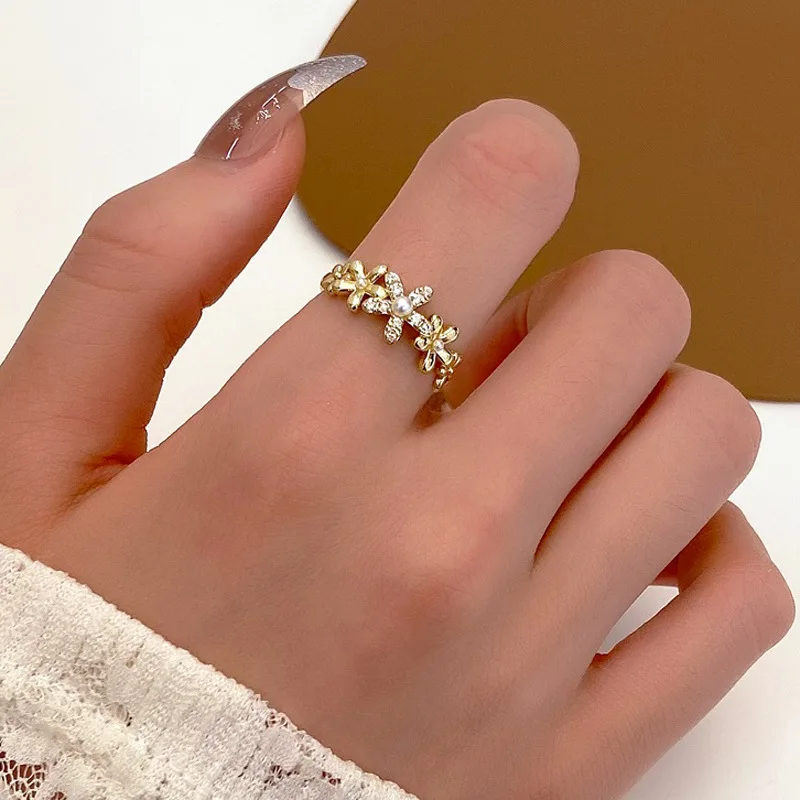 

US Pearl Flower Ring Female Fashion Temperament Minority Design Inlaid Diamond Floret Index Finger Ring Net Red Ring 1$ Postage