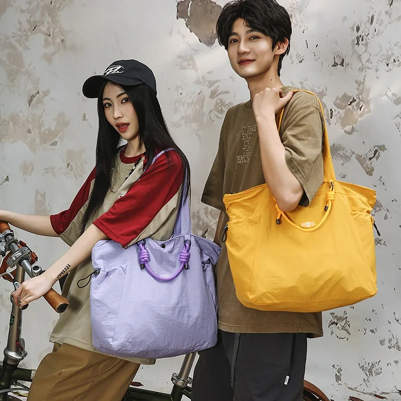 large-capacity-casual-travel-shoulder-bag-men-women-commuting-tote-bag-fashionable-short-trip-bag-for-work-and-leisure