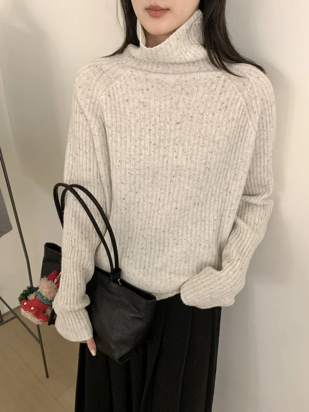 

Autumn and winter women's casual solid color high neck long sleeved loose woolen sweater