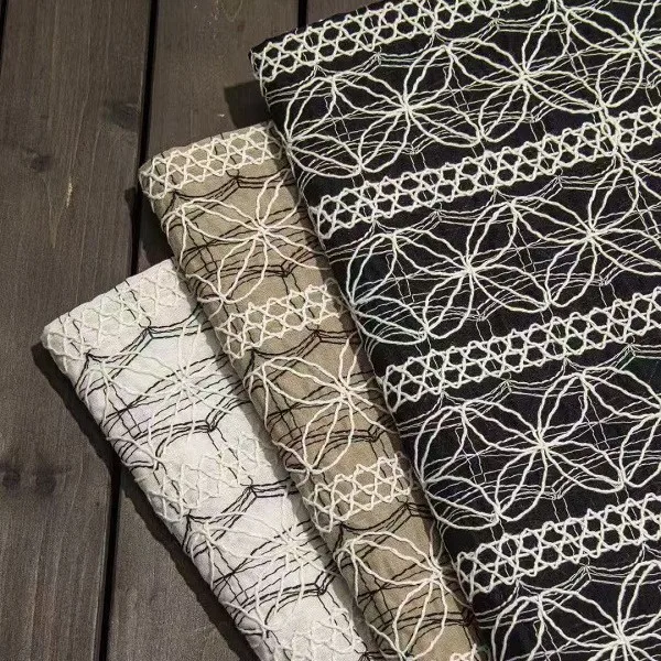 

Geometric four-leaf clover floral embroidered mesh lace fabric, rope embroidery fabric by yard for fashion designers