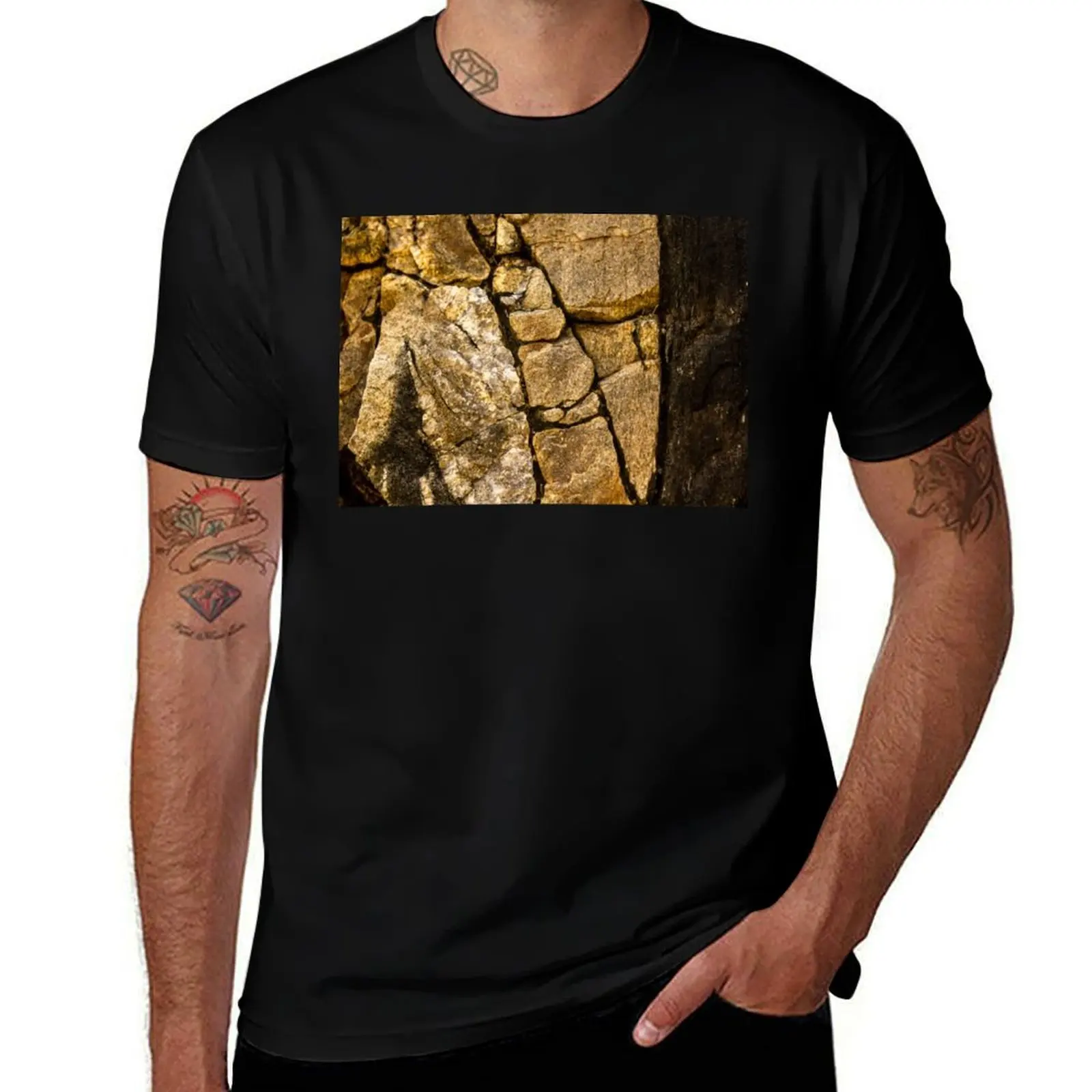 

texture of a rock with golden and black colors T-Shirt graphic shirts anime t shirts Luxury man mens plain t shirts