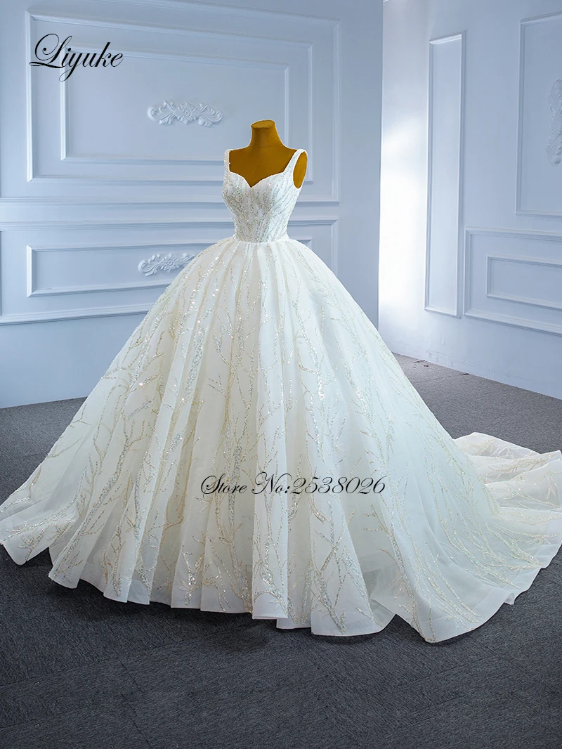 Liyuke مخصص الحبيب السباغيتي الأشرطة الكرة ثوب الزفاف من يزين مذهل الدانتيل التنانير الزفاف