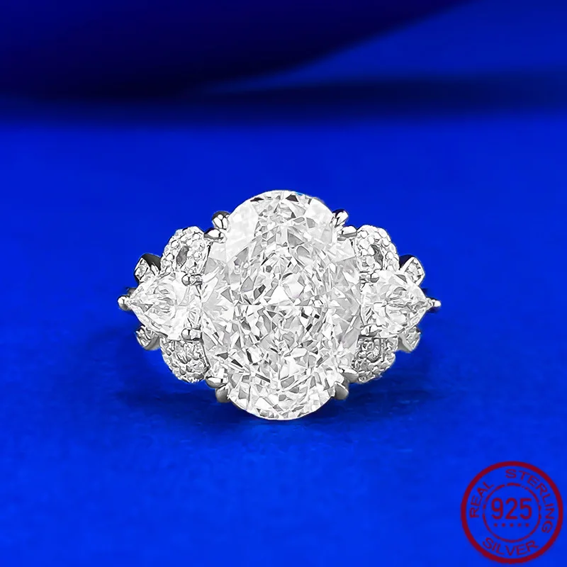 

New European and American S925 Silver Imported High Carbon Diamond 9 * 13 Pigeon Egg Bow Ring Ring Wedding Jewelry