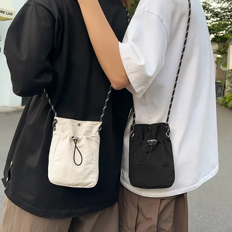 bolsa-transversal-ultra-leve-e-fina-para-homens-e-mulheres-em-cor-pura-bolsa-esportiva-casual-adequada-para-uso-diario-e-atividades-ao-ar-livre