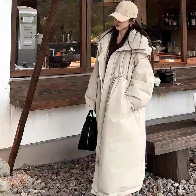 Chaqueta larga de plumón para mujer, gruesa por encima de la rodilla, nueva torta coreana con capucha, cintura suelta y delgada para superar