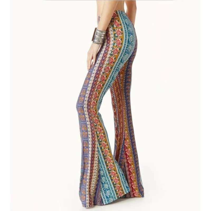 Spring and summer fashion trend: tight-fitting, hugging the body, rose-print flared pants with built-in h