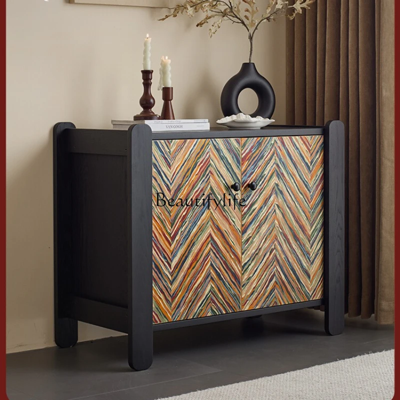 

Modern simple black living room storage cabinet next to the wall sofa