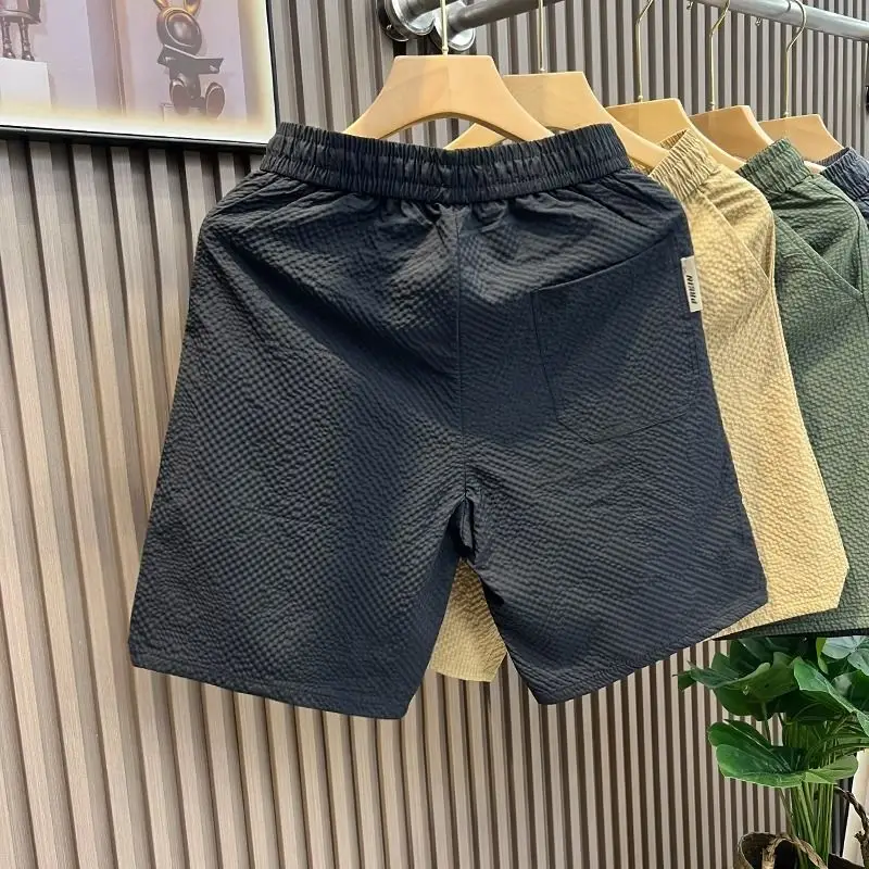 Pantalones cortos con bolsillos para hombre, pantalones cortos de playa de tablero blanco, diseñador de ofertas calientes, novedad en estilo coreano