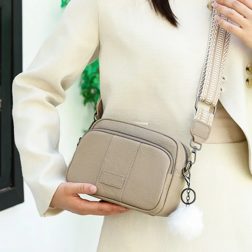 

2026 Handbag Genuine Leather Messenger Bag Women Fashion Style With Wide Shoulder Strap Luxury Hair bulb Crossbody Sac