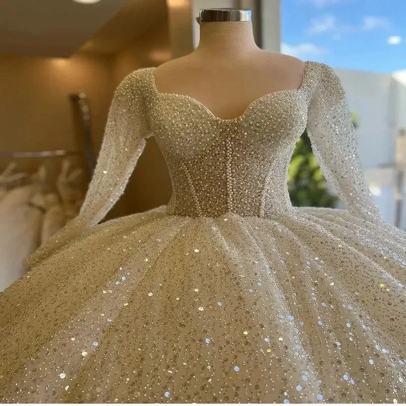 

Luxury Sweetheart Heavy Pearls Sequins Ballgown Wedding Dresses Customized Robe De Mariée Illusion Full Sleeves Bridal Gown