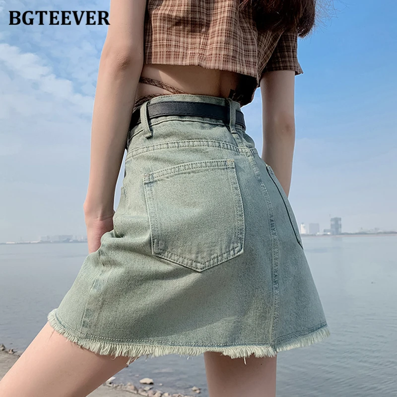 BGTEEVER Stylish Pockets A-line Denim Skirts for Women Vintage High Waist Loose Single Button Tassles Female Jeans Skirts Summer