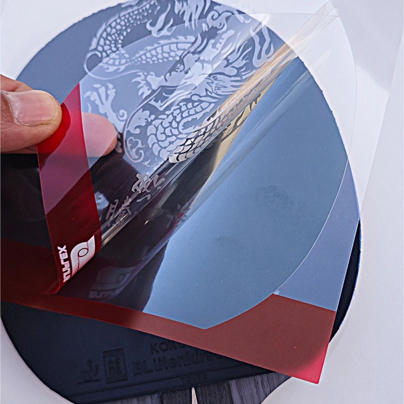 

Table Tennis Racket Protective Film No Cutting Required Suitable for Both Sticky and Non-Sticky Rubbers Washable and Reusable