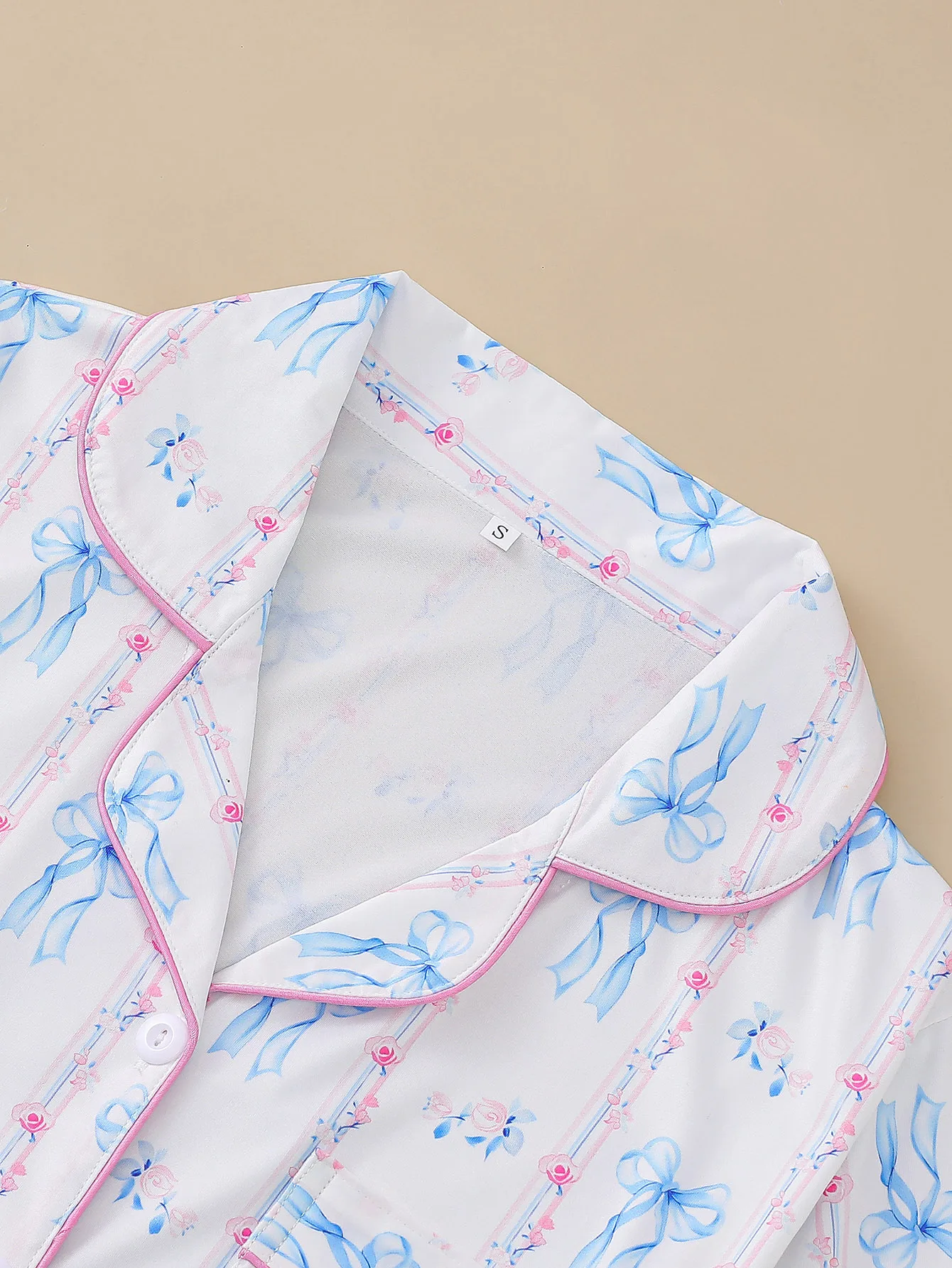 Bow print can be worn on women\'s pajamas lapel button short sleeved tops and loose shorts women\'s home wear
