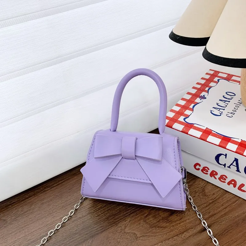 

Универсальные детские маленькие квадратные сумки на плечо из искусственной кожи с бантом, милые однотонные сумки с верхней ручкой для девочек, дизайн с нитью, детский кошелек через плечо с клапаном