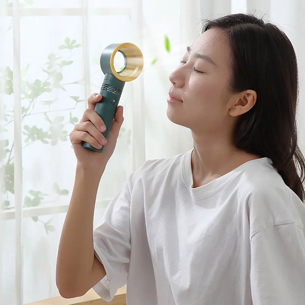 ไร้สาย Leafless ไดร์เป่าผมมือถือมินิพัดลมชาร์จไฟฟ้า Bladeless ไดร์เป่าผมพกพามัลติฟังก์ชั่ผู้ถือโทรศัพท์