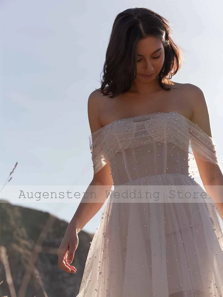 فساتين زفاف ساحرة للضيوف من التل على شكل حرف a فساتين حفلات الزفاف بيضاء مكشوفة الكتف مطوي لؤلؤ برباط فساتين زفاف #5