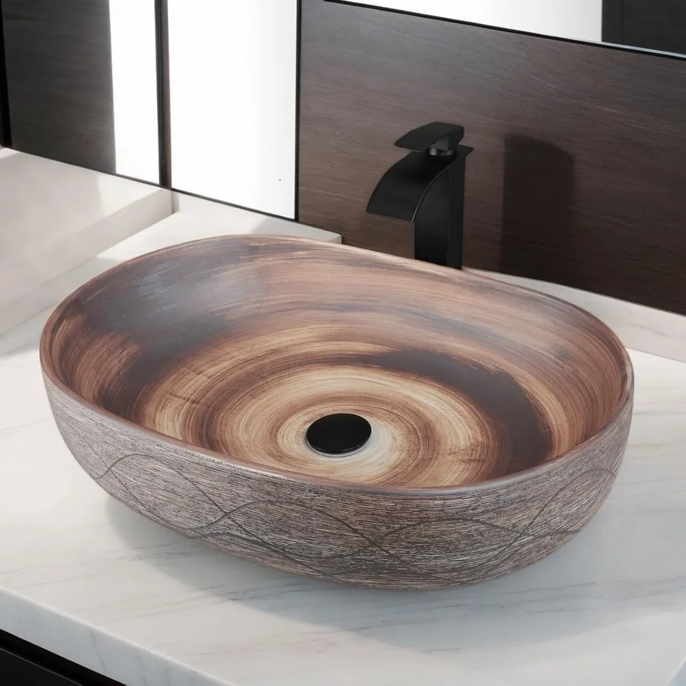 

Oval Ceramic Vessel Sink Set with Waterfall Faucet and Pop-Up Drain, 23 x 16 Inches, Brown for Above Counter Installation
