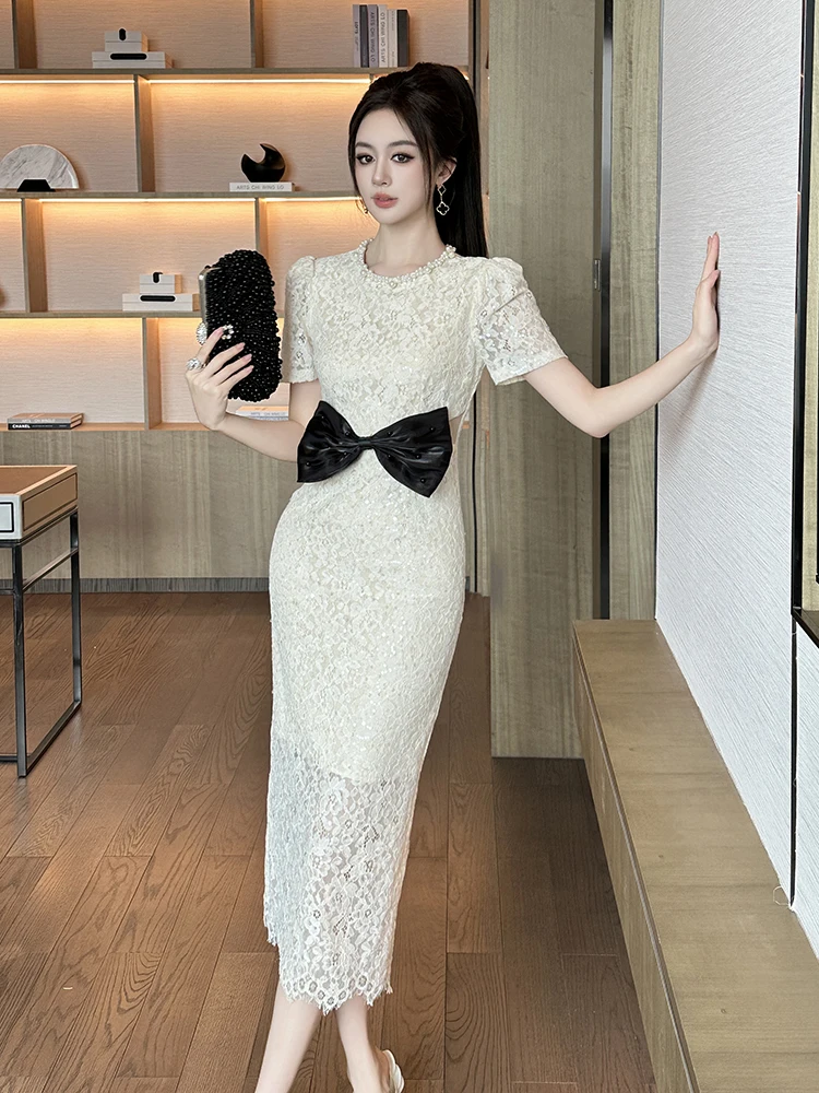 Robe longue en dentelle pour femmes, tempérament français, élégante, célébrité, perlée, col rond, manches courtes, taille haute, enveloppée dans les hanches, été