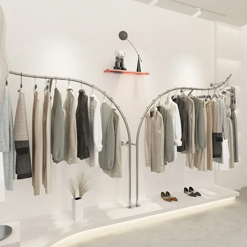 

Clothing store display rack Women's clothing store shelf Simple hanging hanger Wall display rack Store decoration design