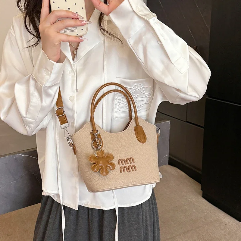 حقيبة ساعي كلاسيكية أنيقة وبسيطة للنساء مع لون سادة فريد من نوعه وإكسسوارات عصرية من الجلد #5