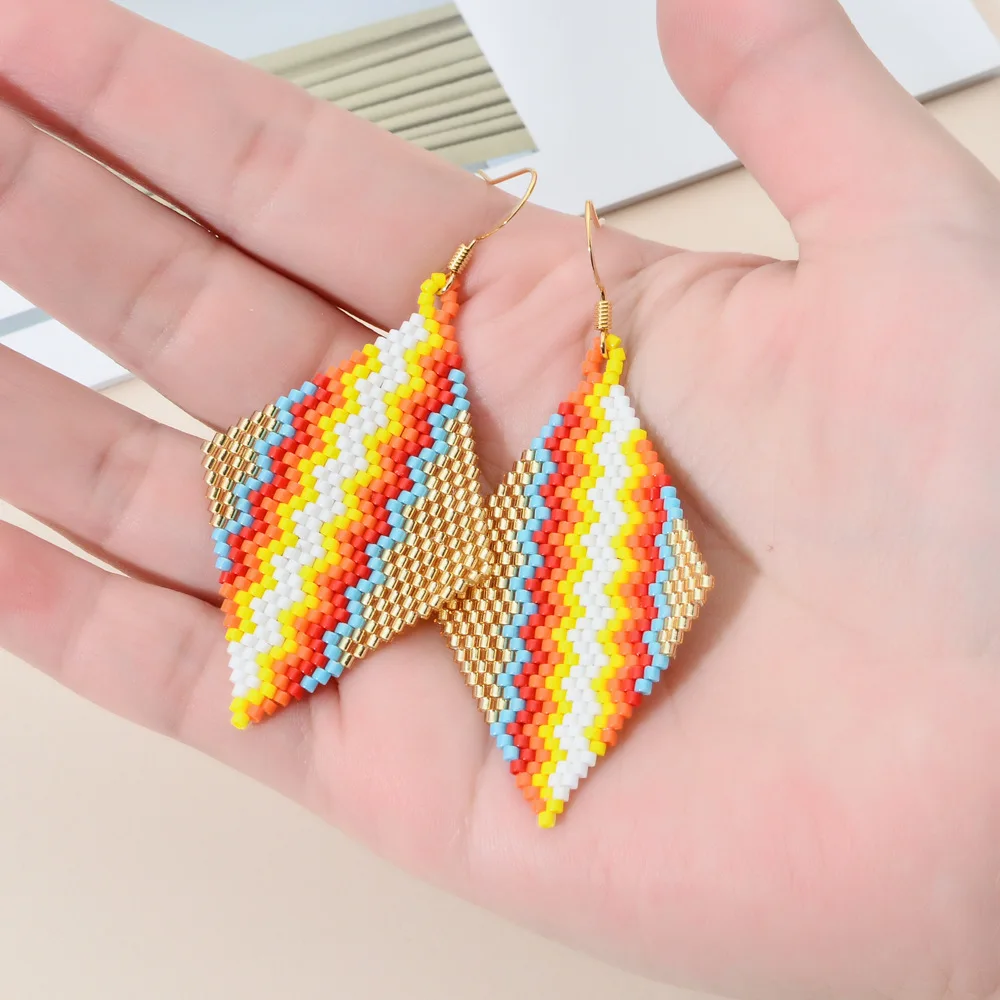 ZGMXR  Rice bead earrings   Hand weaving  Bohemia Gradual color  Rainbow Fashion Simple Geometry  Alloy  Woman  Beaded earrings