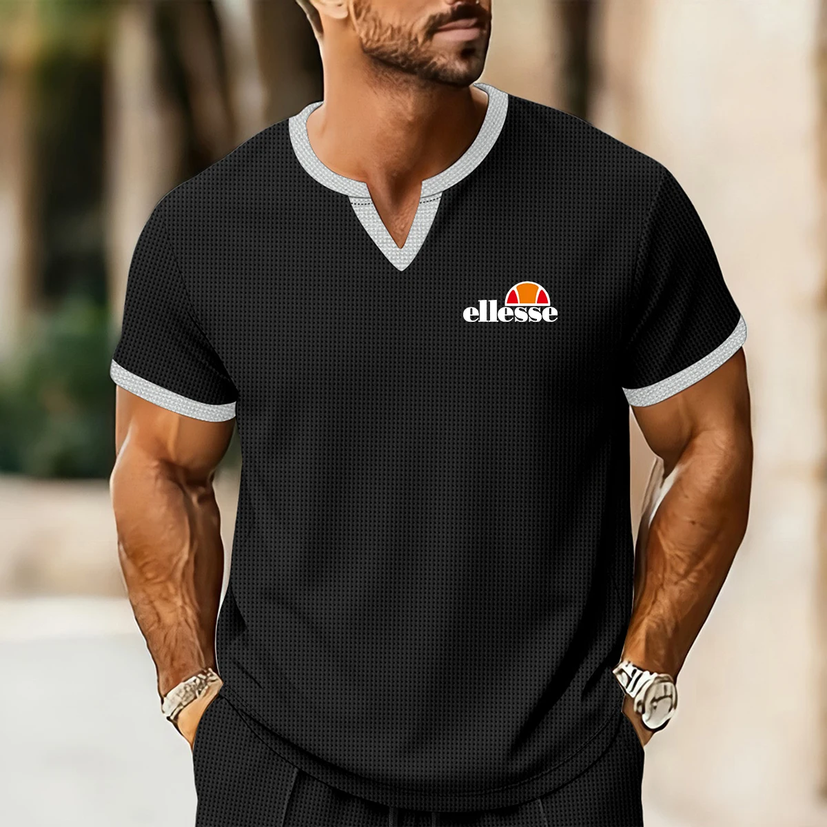 Premium Herren Ellesse T-Shirt: Hautfreundliche Waffelstruktur, Kontrastbesatz an Hals und Ärmeln, klassisches Ellesse-Logo
