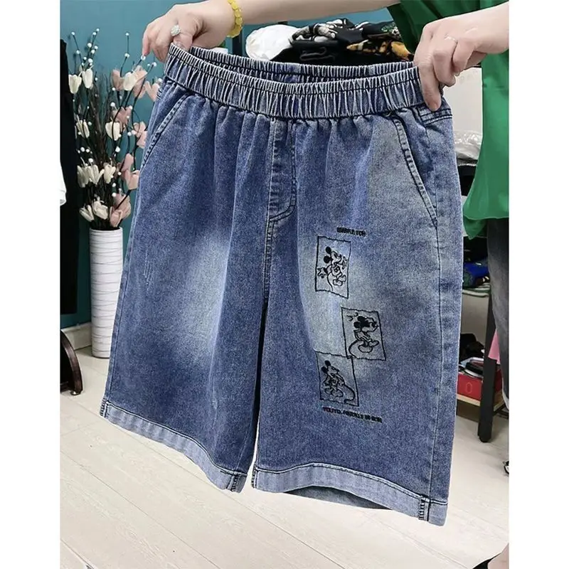 

ed hardyWomen's Plus Size Disney Mickey Embroidered Denim Shorts Summer Elastic Waist Oblique Pocket Cute Slim Knee Length Pants