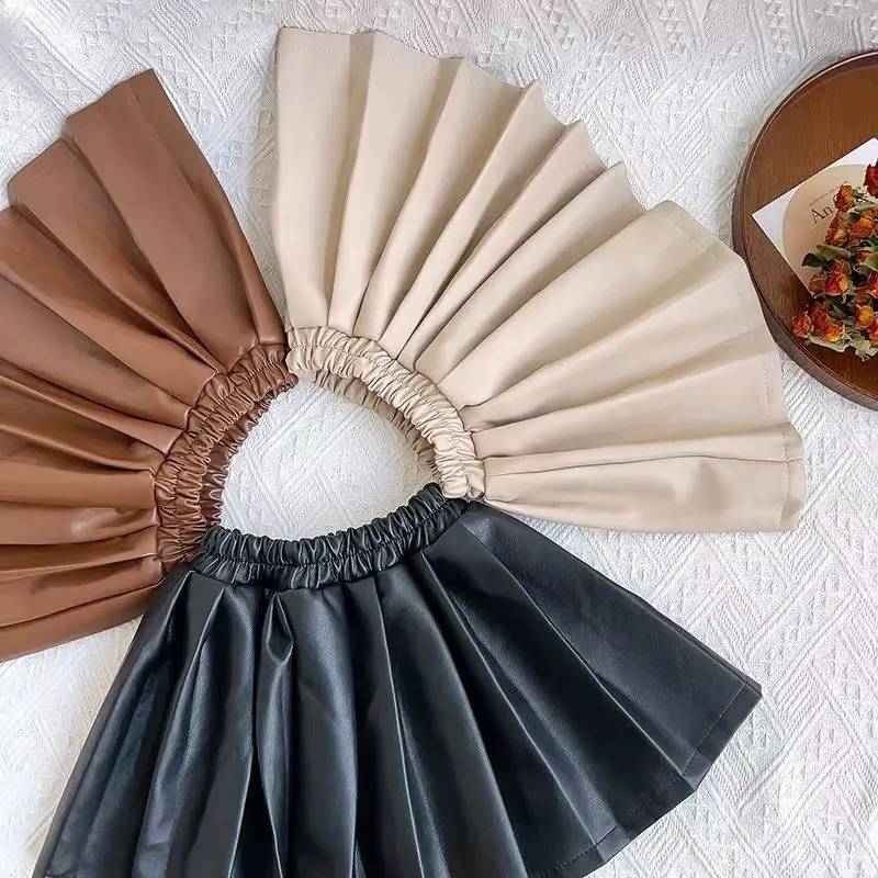 

Girls' Autumn And Winter New 2025 Small And Medium-sized Baby Girl Leather Skirt Solid Color Pleated Skirt Versatile
