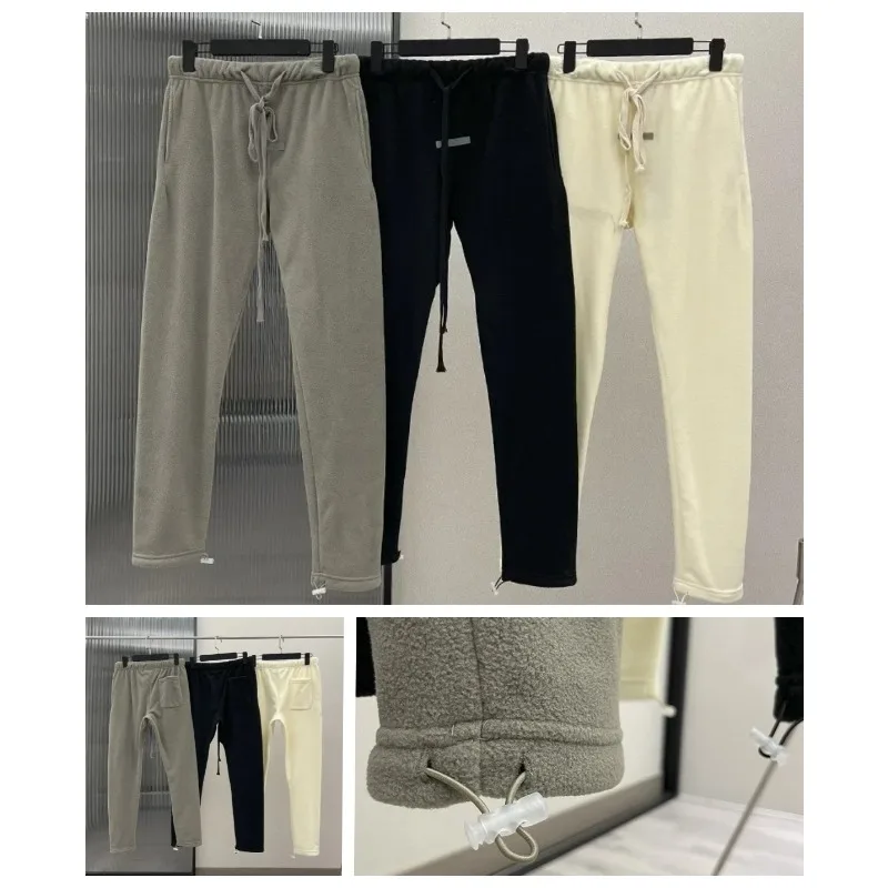 

Men's Wool Pants Classic Design Silicone Logo Wool Pants Fashionable Couple High Street Loose Insulated Thick Pants