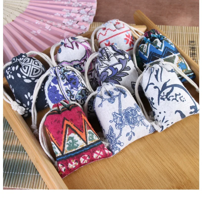 10pcs/lot Linen Drawstring pocket Cute Pattern Printed DIY wedding Candy Storage Bag Travel Makeup Cloth Shoes Sundries Storage