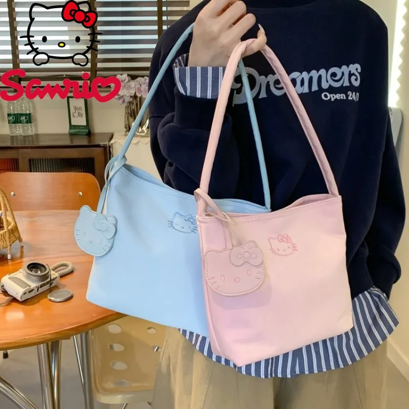 

Hello Kitty 2026, новая женская сумка через плечо, модная женская сумка высокого качества, однотонная универсальная женская сумка для хранения мобильных устройств, женская сумка