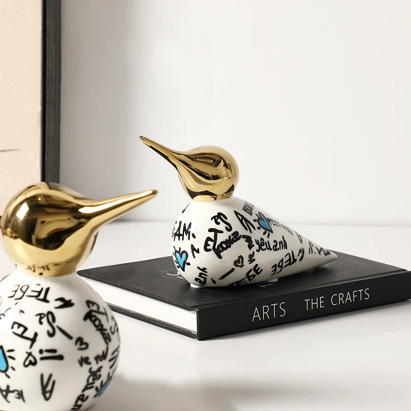 Modern light luxury abstract pattern gold-billed bird ceramic ornament for home living room, wine cabinet, children's room, and