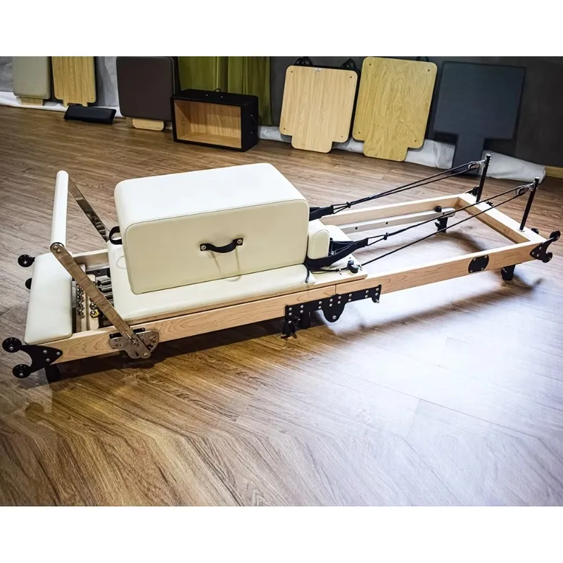 

Высококачественный складной пилатес-реформер из белого клена с коробом и доской для прыжков