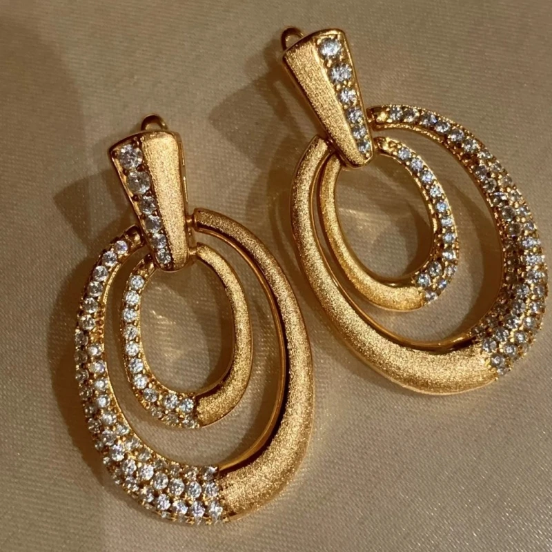 

2025 Italy simple personality hand-brushed craft earrings for women light luxury and micro-inlaid high-grade earrings