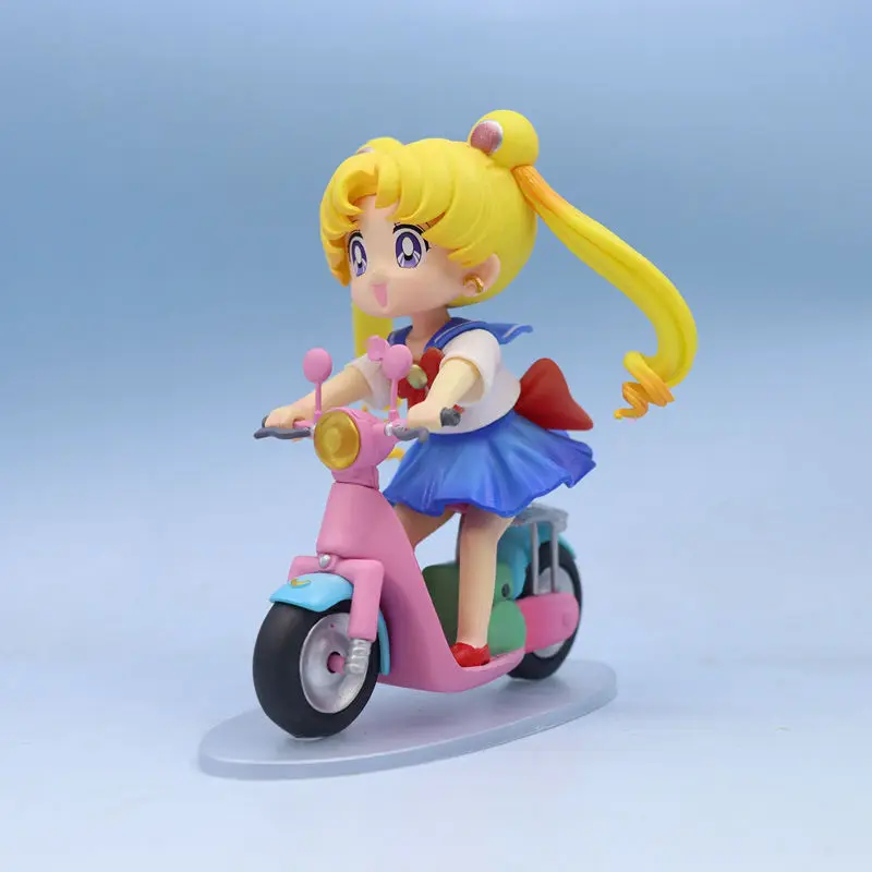 

13cm Cartoon Sailor Moon Figure Q Version Cute Tsukino Usagi Ride A Bike Figurine Collection Desktop Decor Ornament Kid Toy Gift