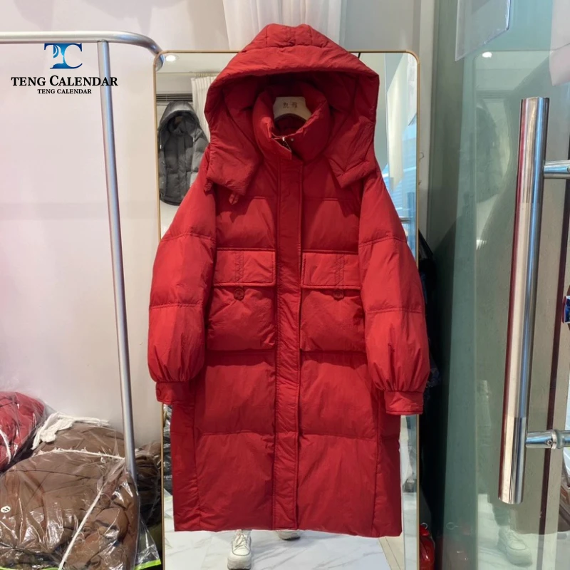 Korean style waist cinched hooded down jacket, medium to long thick and warm over the knee jacket, women 2025 winter new style