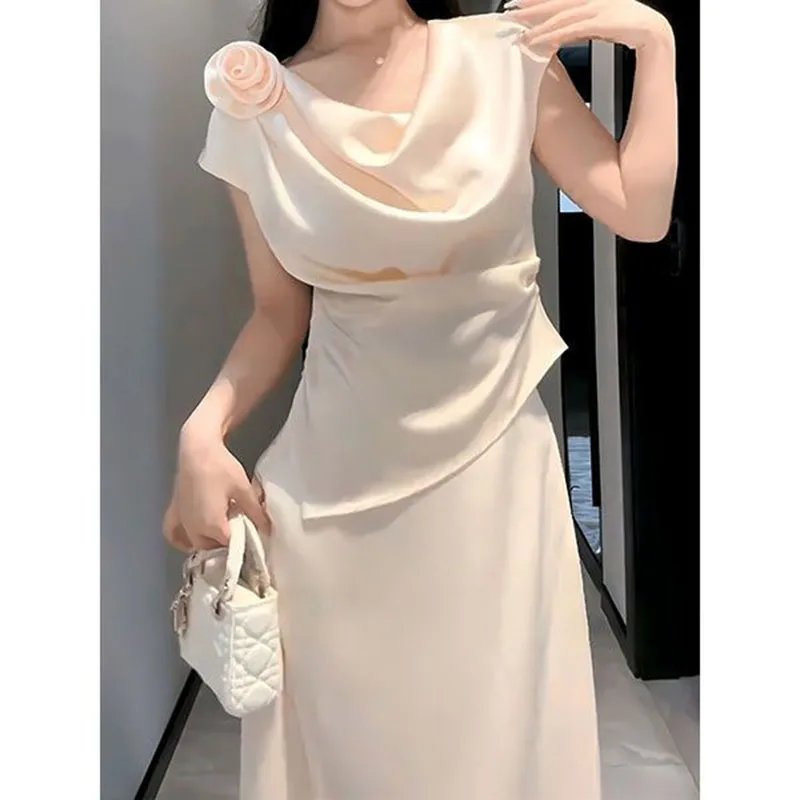 Skirt suit women's summer 2024 new high-grade sense slim irregular top temperament high waist skirt two-piece suit.