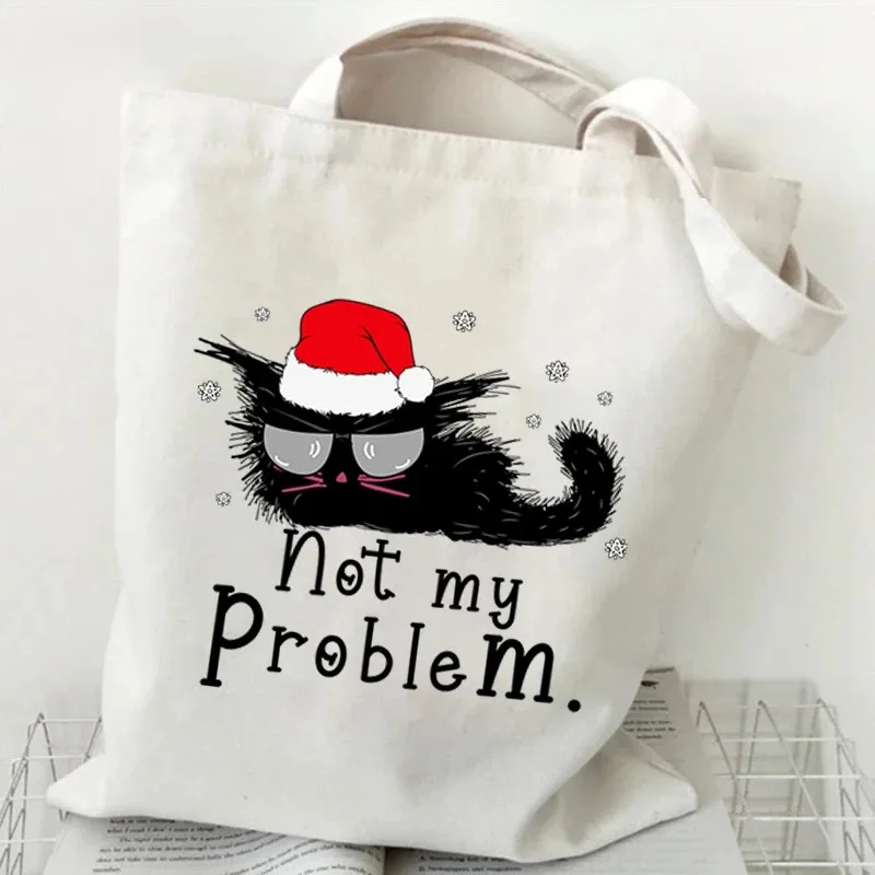 

Festive Sassy Black Cat with Santa Hat Sunglasses Christmas Canvas Tote Bag with Snowflake Accents Funny Holiday