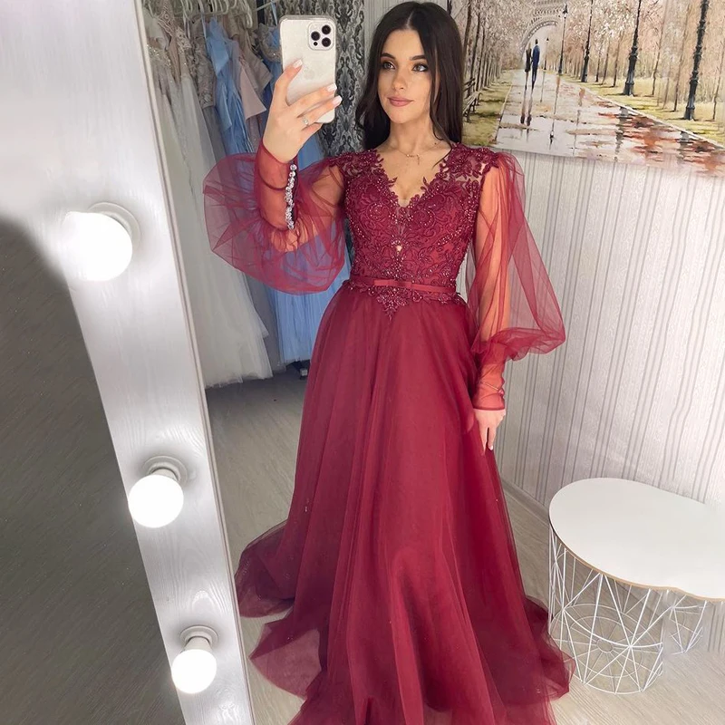 فستان سهرة من Vestidos De Noche برقبة على شكل V مزين بالخرز وأكمام طويلة وسحاب من التل على شكل حرف a