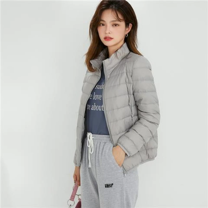 Chaqueta de plumón de pato blanco ultraligera para mujer, chaqueta de manga larga ajustada, de Color sólido, novedad, invierno, 2022