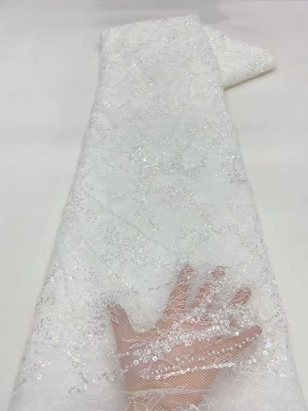 

Новая коллекция 2026: Хит продаж – Тюлевое кружево с бисером и пайетками. Новинка в африканском, нигерийском и французском стиле для высококачественных свадебных и вечерних платьев, а также для пошива одежды для невест.